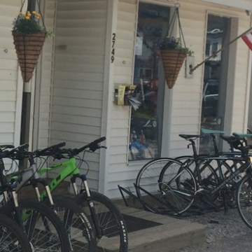 a bicycle parked in front of a building