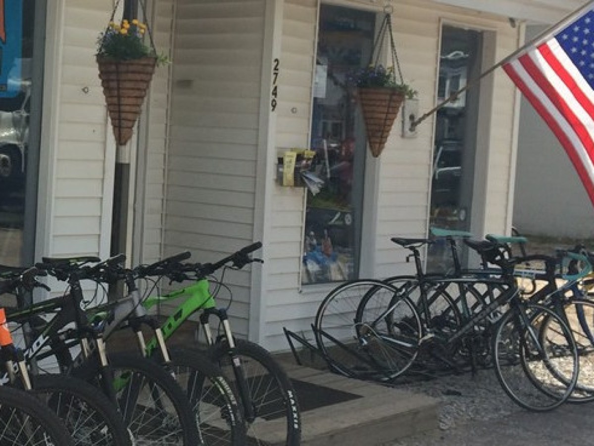 a bicycle parked in front of a building